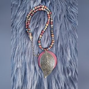 Beautiful Desert Jasper necklace with an Antique Bronze, and warm red focal.